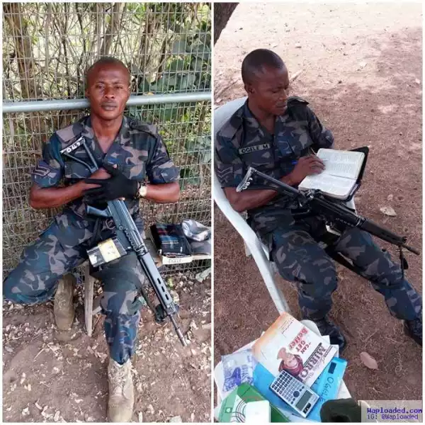Air Force Officer Pictured Reading His Bible,Armed With His Gun